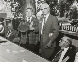 Jack W. Dei, Sr. receives a stool at the Grange Dairy Day at the California State Fair, August 29, 1973