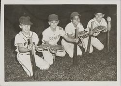 Little Leaguers with bats and crabs