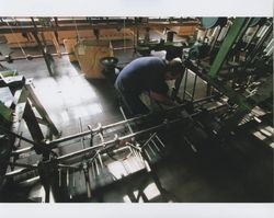 Russell Strickland working on a braiding machine, Sunset Line & Twine Company in Petaluma, California, Dec. 5, 2006