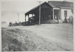 Ben Noonan driving the winning Stoddard-Dayton car in front of the Dry Creek Store during a road race