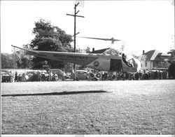 Santa Claus in a helicopter courtesy Tomasini Hardware at McNear Park, Petaluma, California about 1948