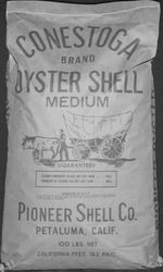 Photograph of Conestoga Brand Oyster Shell bag of the Pioneer Shell Co., Petaluma, California, 1958