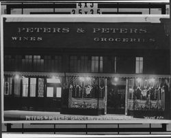 Night view of Peters and Peters Grocery, Petaluma, California, 1910