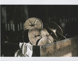 Bin of take-up reels, Sunset Line & Twine, Petaluma, California, Dec. 2006