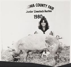 Lynn Steindorf and her pig at the Sonoma County Fair, Santa Rosa, California, 1980