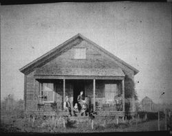 Will and Martha Lyttaker with their children Julia and Edward in front of their home in Santa Rosa, California, 1901