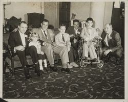 Sport figures with crippled children who participated in the charitable events of the Red Coat Organization, Santa Rosa, California, 1960