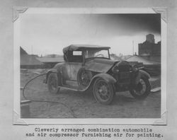 Automobile serving as air compressor for painting the Poultry Producers of Central California feed mill, Petaluma, California, 1938