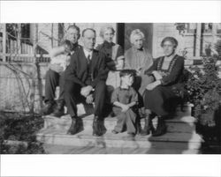 Neil/Medley family sitting on their front porch steps at 231 Wilson Street, Petaluma, California, about 1924