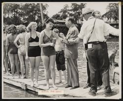 Billie Staples getting a trophy at the 1947 wine barrel regatta during the Healdsburg Harvest Festival, Healdsburg, California, August 31, 1947