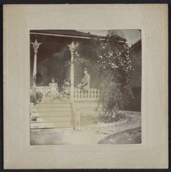 Mr. and Mrs. Young on the porch of their Rose Court home