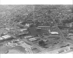 Aerial view of downtown Petaluma, California, and the Petaluma Turning Basin, 1978