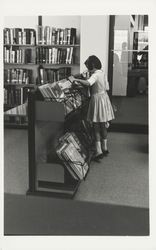 Patrons using the Dagny Juell Boys and Girls Room of the Library