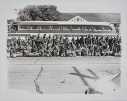 Boy Scouts embarking on a bus, Petaluma, California, 1940