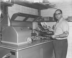 Printing photographs at the Petaluma Argus-Courier, Petaluma, California, about 1963