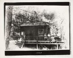 Unidentified Kenwood family on the porch of their home