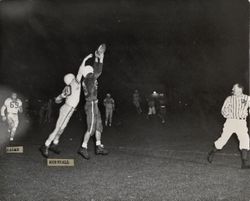 Completed pass play during Petaluma Leghorn game against Hamilton Air force Base