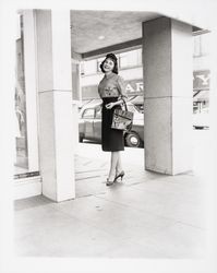 Evelyn Knutsen at entrance to The White House, Santa Rosa, California, 1959