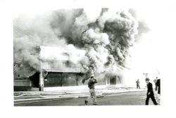 Rex Hardware building in flames, Petaluma, California, Jun. 21, 1942