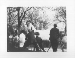 Newsreel cameramen filming dancers atop Chanticline the chicken, Petaluma, California, March, 1920