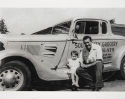 Joe Graveman poses by the South City Grocery delivery truck, Petaluma, California, 1948