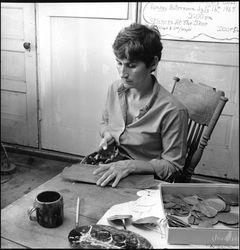 Ginny Lancaster working on metal work project, Santa Rosa, California, July 9, 1968