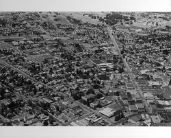 Aerial view of Petaluma, California looking west and southwest from Western Avenue and Petaluma Blvd., July 28, 1973