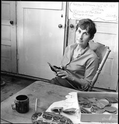 Ginny Lancaster working on metal work project, Santa Rosa, California, July 9, 1968