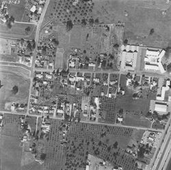 Aerial views of Coddingtown Shopping Center west to Range Avenue and south to Jennings Avenue