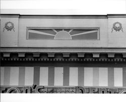 Frieze on the Denton's Apparel building