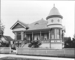 Two women on the porch of Henry Poehlman's house