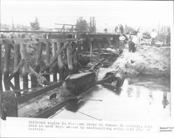 Railroad engine in Petaluma River at Bridge/Hopper Street trestle, Petaluma, California, 1941