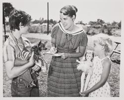 Woman takes information at the Sonoma County Fair, Santa Rosa, California, July 21, 1958