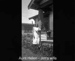 Helen Nissen posing in front of a Petaluma home. in Petaluma, California, about 1938