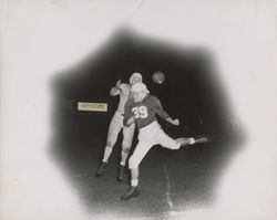 Pass reception during Petaluma Leghorn game against an unidentified team