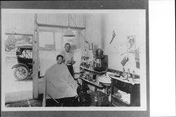 Johnny Hausmann having his hair cut by Ben Brians