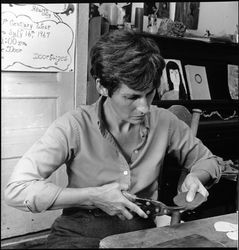 Ginny Lancaster working on metal work project, Santa Rosa, California, July 9, 1968