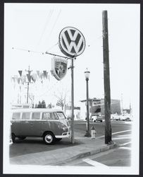 Volkswagen bus on Veale Motors car lot, Santa Rosa, California, 1964