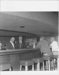 Bill Soberanes and Mike Gilardi behind the bar at Gilardi's, Petaluma, California, 1966