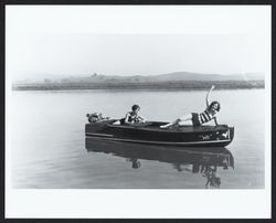 Elizabeth Frey and Cathleen "Topsy" Bond adrift on Petaluma River in the motorboat "We", 1930