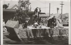 Cotati "Indian Lore" float in an unidentified parade, Petaluma, California, about 1962