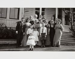 McNear and Denman posing on the front steps of Bellevue, the McNear residence, Petaluma, California, about 1910