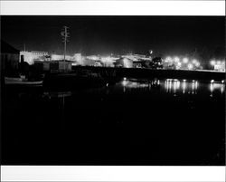 Nighttime view of the Petaluma Turning Basin, Main Street and Washington Street