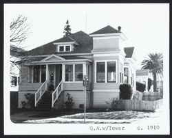 Late Queen Anne cottage with square tower