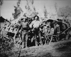 Ed and Will Lyttaker return from a hunt, about 1890