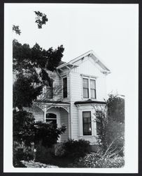 Two story Italianate residence with gable roof