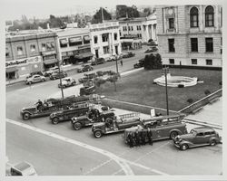 Fire trucks parked on Fourth Street in front of Court House