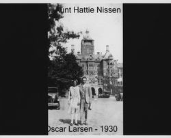 Hattie Nissen standing with Oscar Larsen at an unidentified location, 1930
