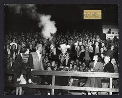 Horsetrader Ed of San Francisco and crowd at Leghorn game, Petaluma, California, Oct. 7, 1950