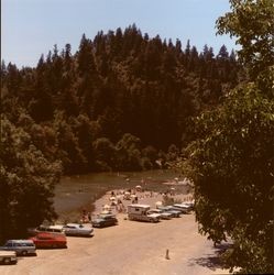 Cars and bathers at the Guerneville Beach, Guerneville, California, 1970